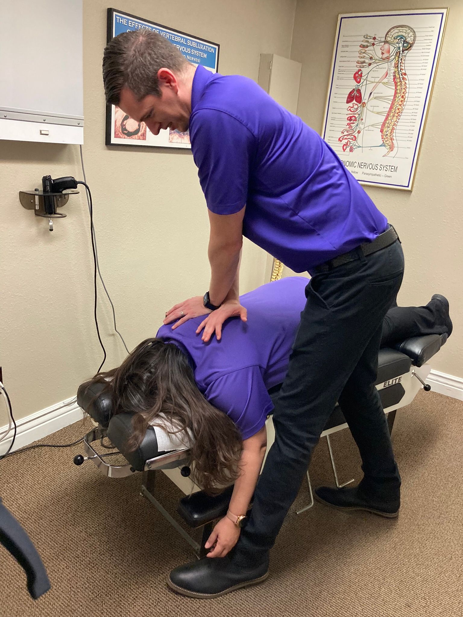 Dr. Matt adjusting a patient